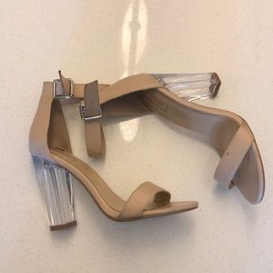 Nude lucite heels